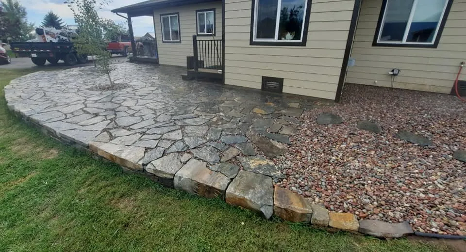 Custom lawn mowing service for residential properties in Polson, MT by Apex Lawn and Landscape