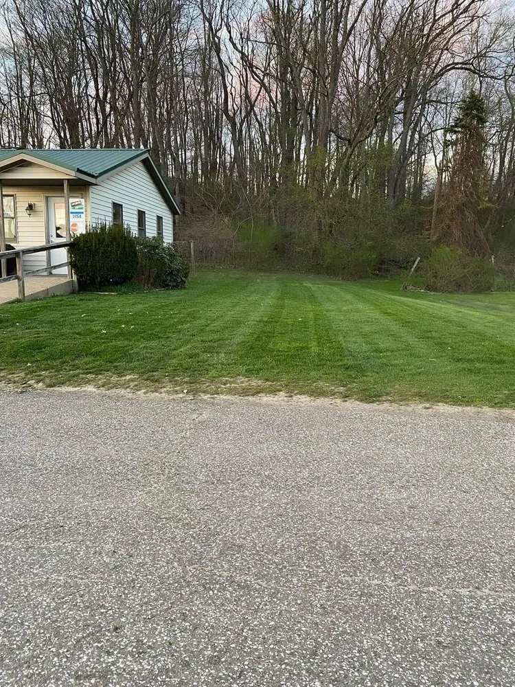 Expert garden landscaping with custom design in Pleasantville, PA by Apex Outdoor Solutions