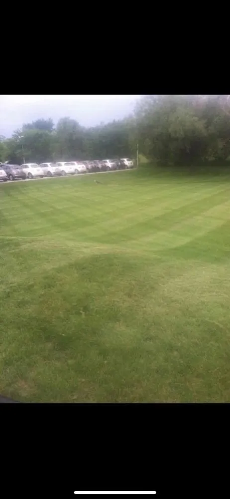 Professional lawn care service for beautiful yards in Windsor Heights, IA by Apex Property Services