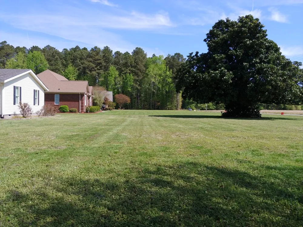 Professional residential landscaping with custom design in Smithfield, VA by Apple Lawn Care