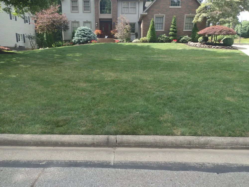 Expert yard maintenance for residential properties in Akron, OH by Apple Seed Lawn Care
