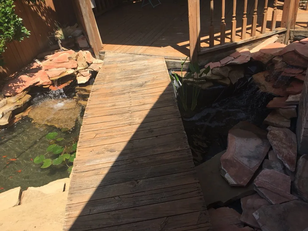 Custom garden landscaping for year-round maintenance in Grapevine, TX by Aqua Environmental Landscapes