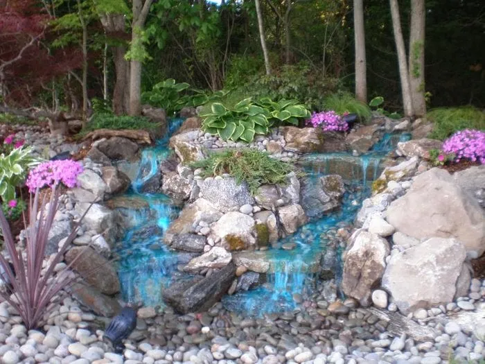 Affordable landscaping services for homes in Coram, NY by Aquatic Creations Corp.