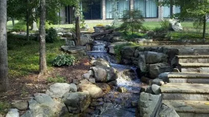 Custom landscape design with custom design in Grantville, GA by Aquatic Creations