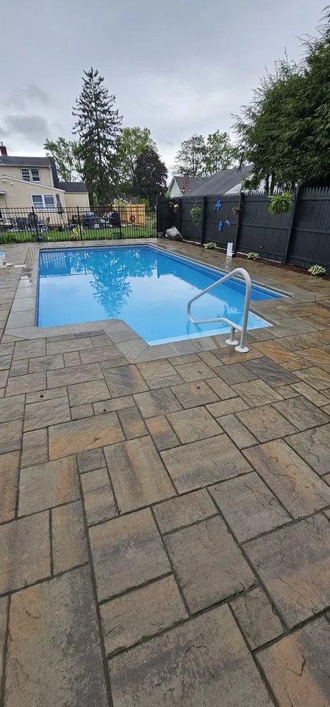 Local landscape installation with custom design in Northford, CT by Aquatic Pool & Spa Services