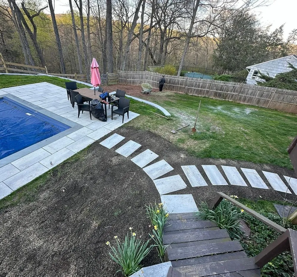 Professional yard cleanup service for outdoor upgrades in Peapack, NJ by Aquino Brothers Landscaping