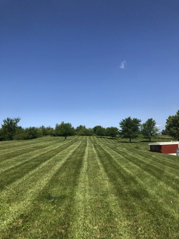 Reliable lawn mowing service in Coralville, IA by AR Concrete Hardscaping