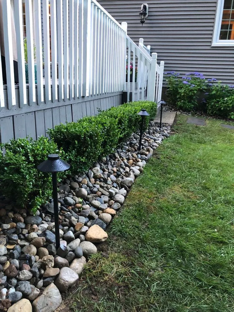 Reliable lawn mowing service with custom design in Freehold, NJ by A&R Pavers and Landscaping