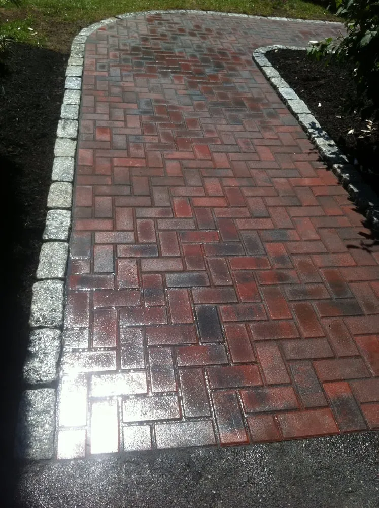 Custom landscape installation for year-round maintenance in East Freetown, MD by Araujo Landscaping