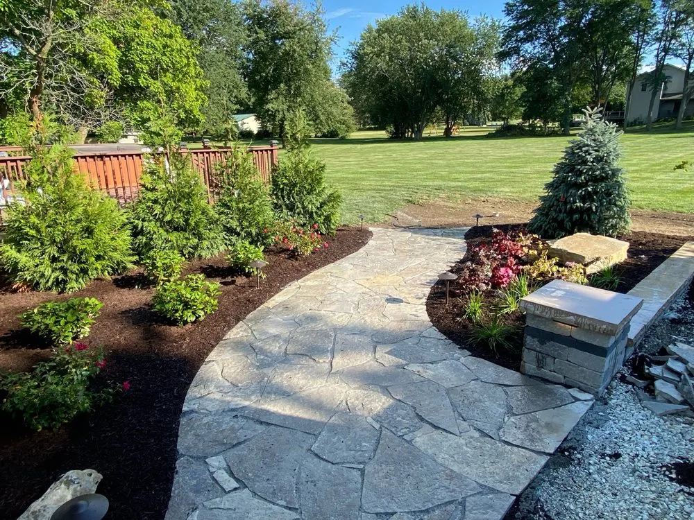 Custom yard cleanup service for homes in Oswego, IL by Arbeen Landscaping