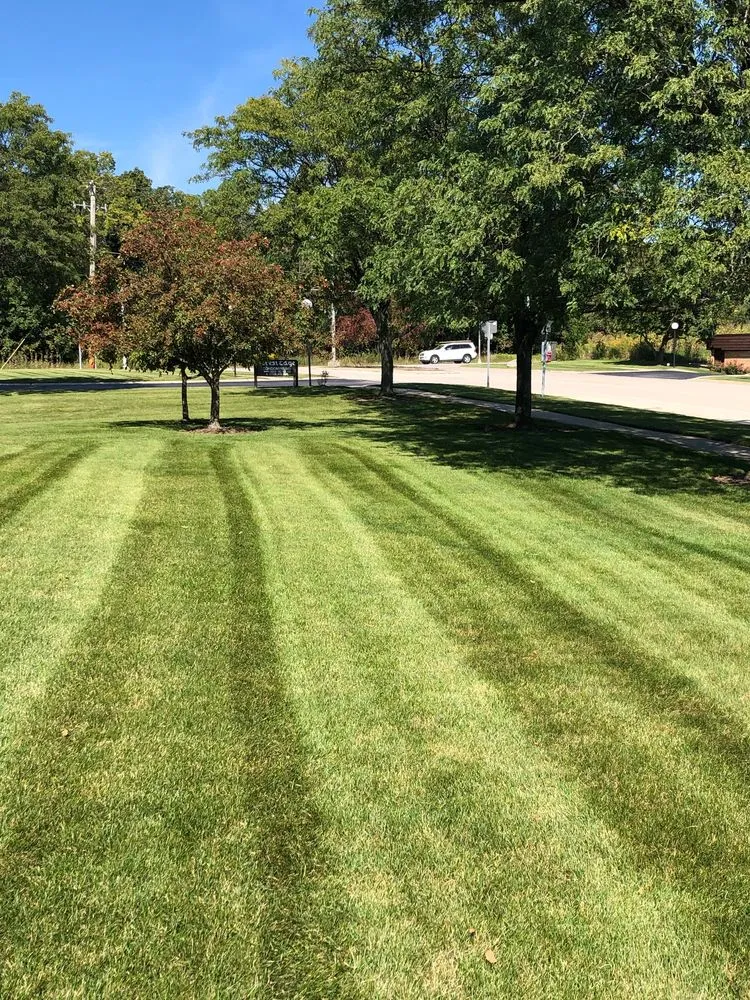 Professional lawn mowing service for year-round maintenance in West Chicago, IL by Arbor Earth & Snow