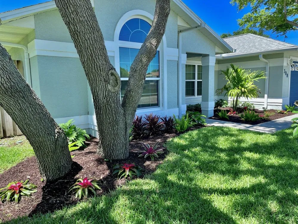 Professional residential landscaping with custom design in Cocoa, FL by Arbor Master Tree & Landscape