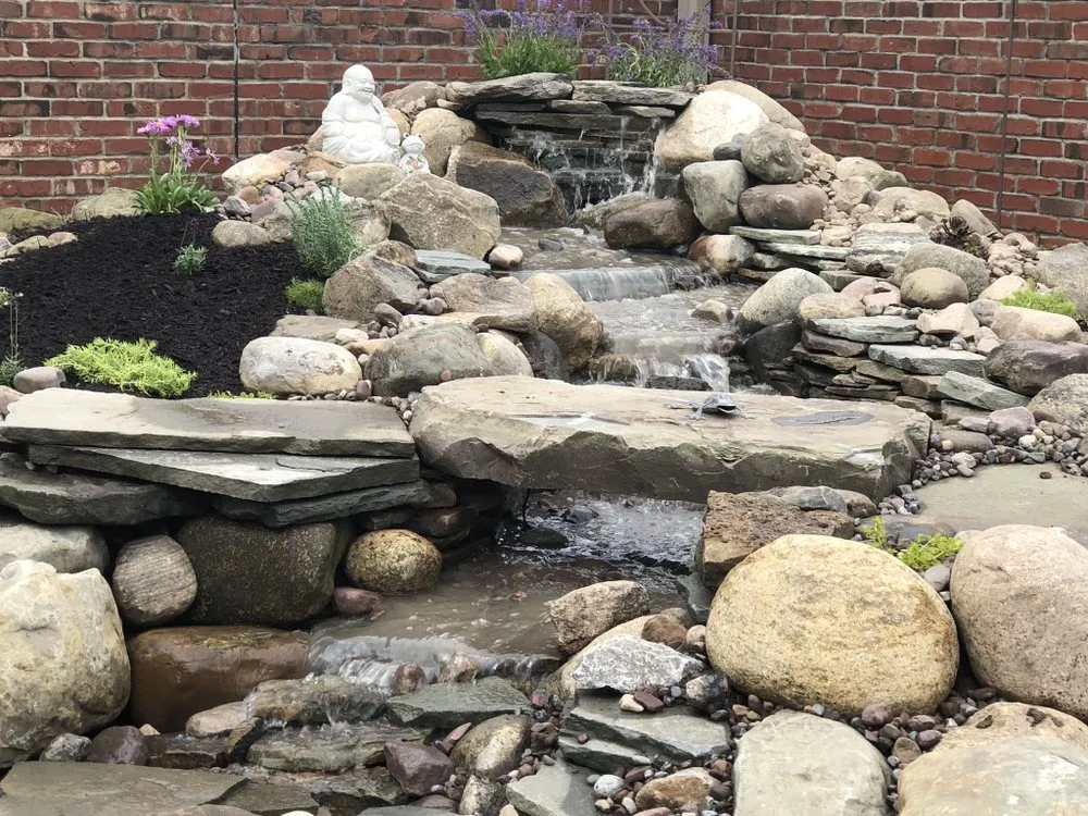 Top-rated garden landscaping with custom design in East Amherst, NY by Arbordale Gardens