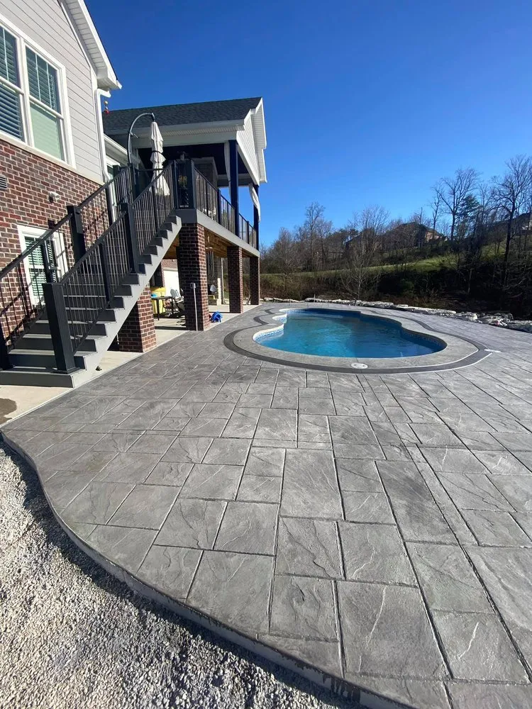 Expert lawn mowing service for homes in Louisville, KY by Architectural Concrete Construction