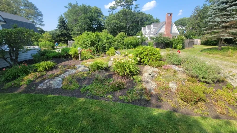 Custom landscape installation in Kennebunkport, ME by Arcturian Landscaping & Property Management
