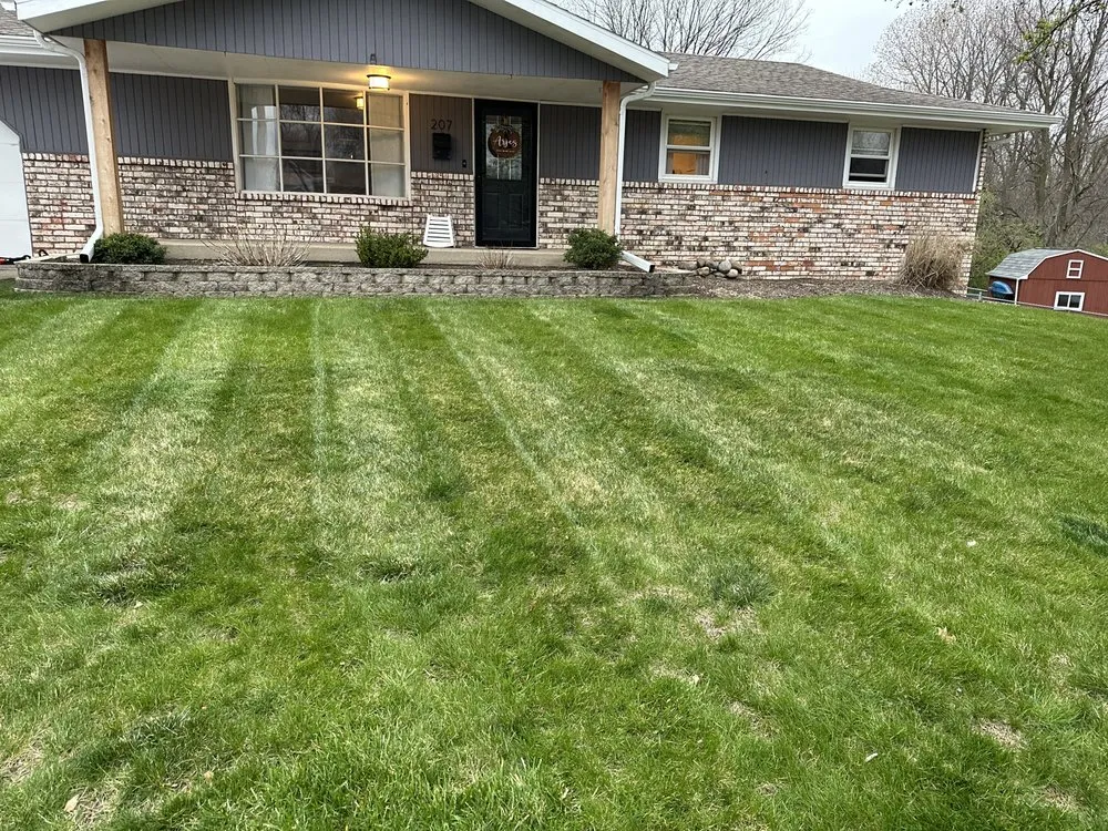 Local lawn mowing service in Pekin, IL by Arjes Family Lawn Care