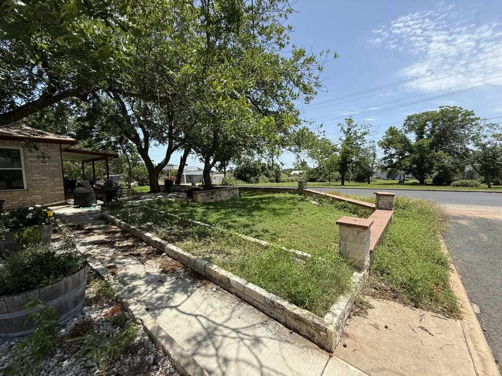 Affordable residential landscaping experts serving Comfort, TX - Armando Lawn Tree Trimming Window Handy Man Services