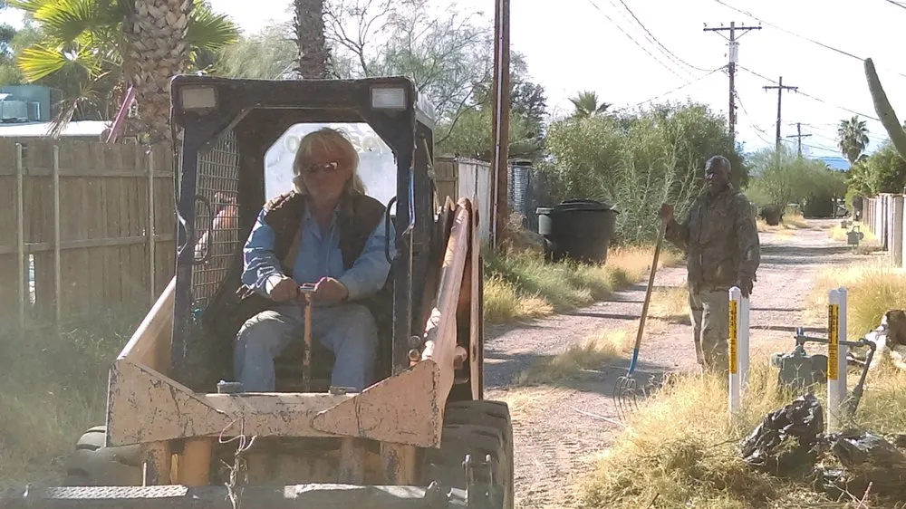 Custom lawn mowing service for outdoor upgrades in Tucson, AZ by Armando's Hauling & Bobcat Service