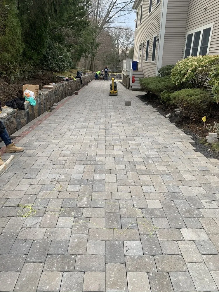 Custom outdoor landscaping for outdoor upgrades in Dracut, MA by Armstrong General Machinery & Landscaping