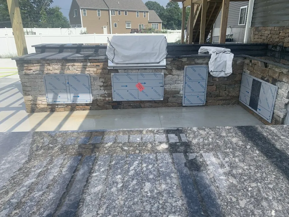 Top-rated garden landscaping with custom design in Dracut, MA by Armstrong General Machinery & Landscaping