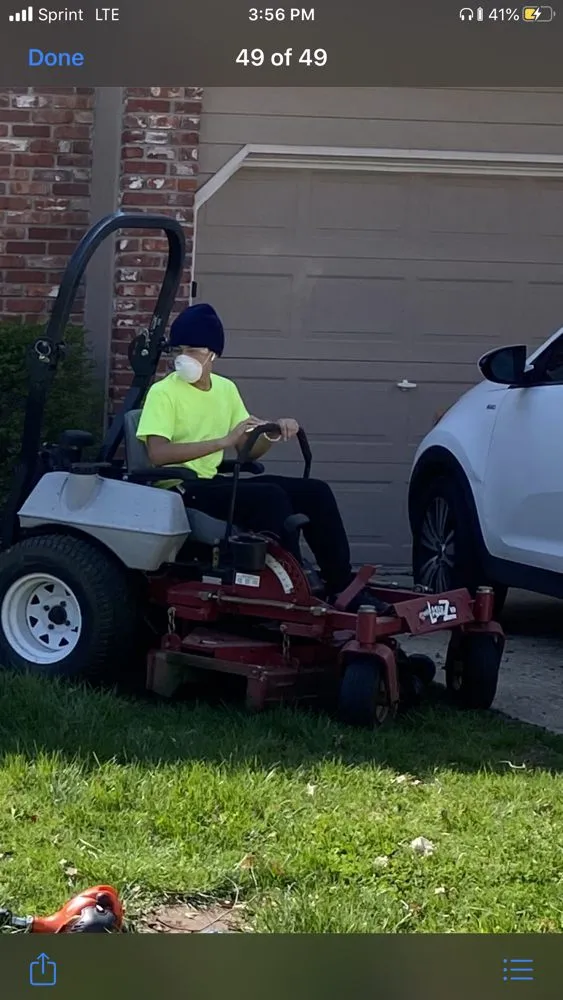 Professional yard cleanup service with custom design in Sugar Creek, MO by Aron & Sons Lawn Care