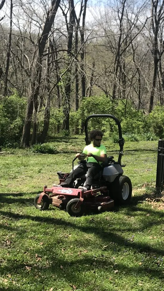 Professional yard cleanup service for outdoor upgrades across Sugar Creek, MO - Aron & Sons Lawn Care