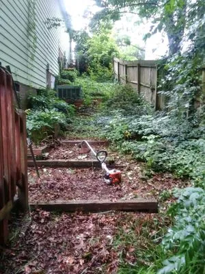 Around The Clock Lawn Care Logo