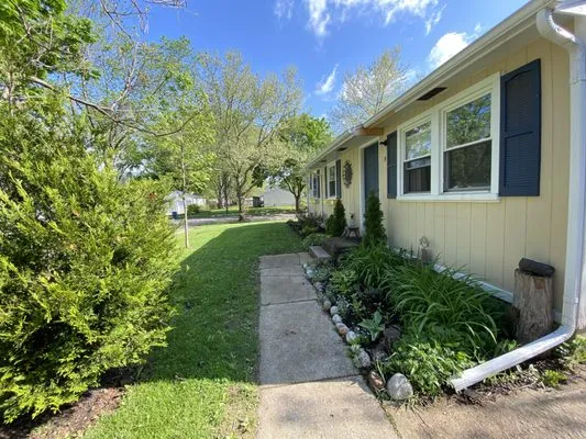Around the Corner Lawn Care and Gardening - Ann Arbor Logo
