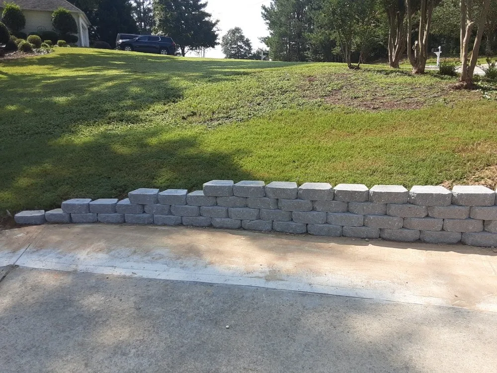 Reliable yard cleanup service with custom design in Thomaston, GA by Arrington's Drainage & Landscape