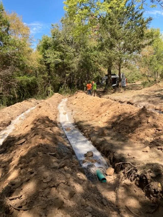 Custom landscape installation in Van Buren, AR by Arrow Dirt Works