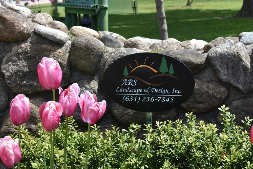 Custom lawn care service for year-round maintenance across Smithtown, NY - ARS Landscape & Design