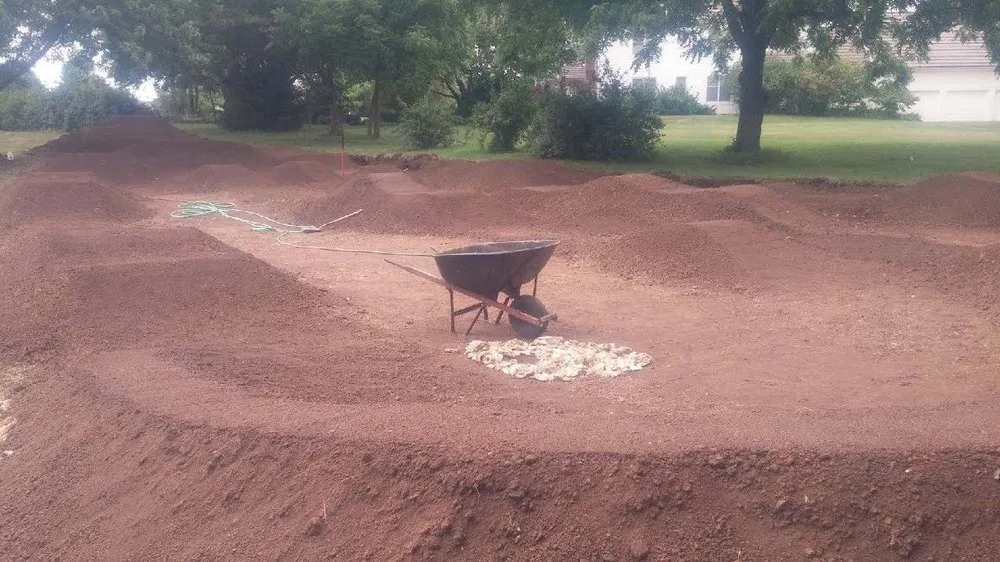 Trusted yard cleanup service in Overland Park, KS by Art Kesterson Topsoil