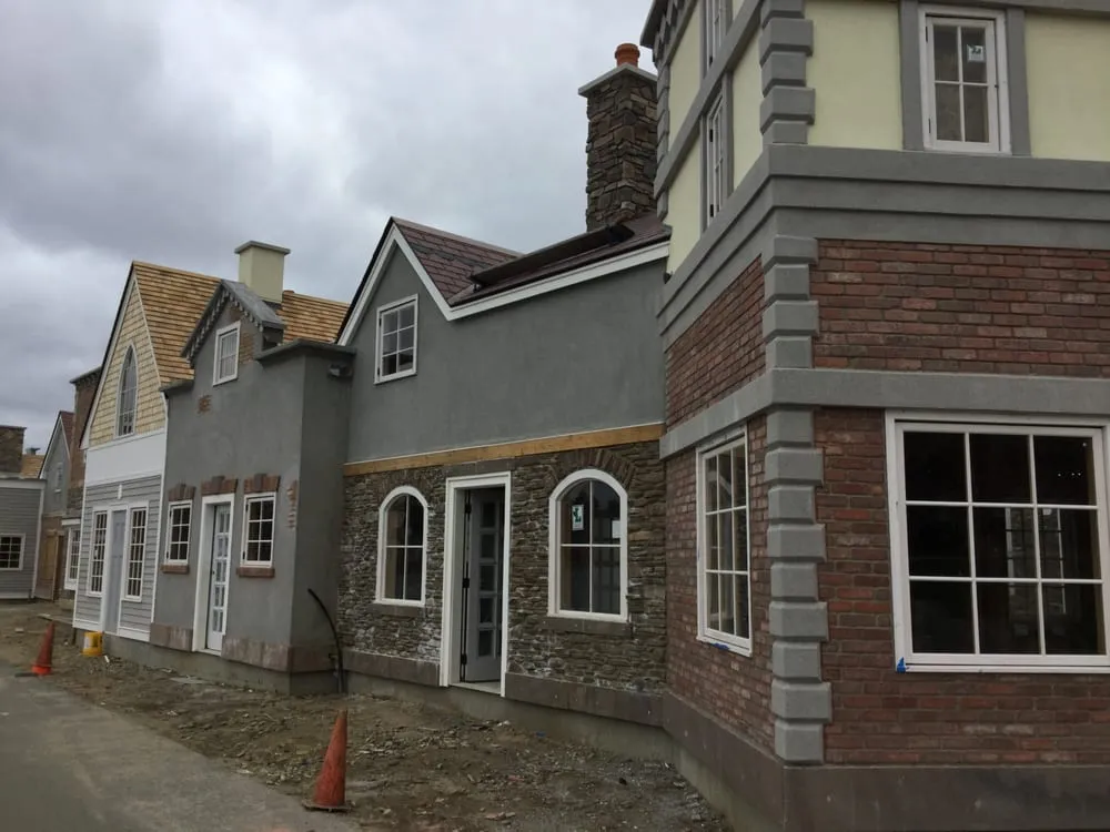 Custom lawn mowing service for residential properties across Acushnet, MA - Art Stonework Construction