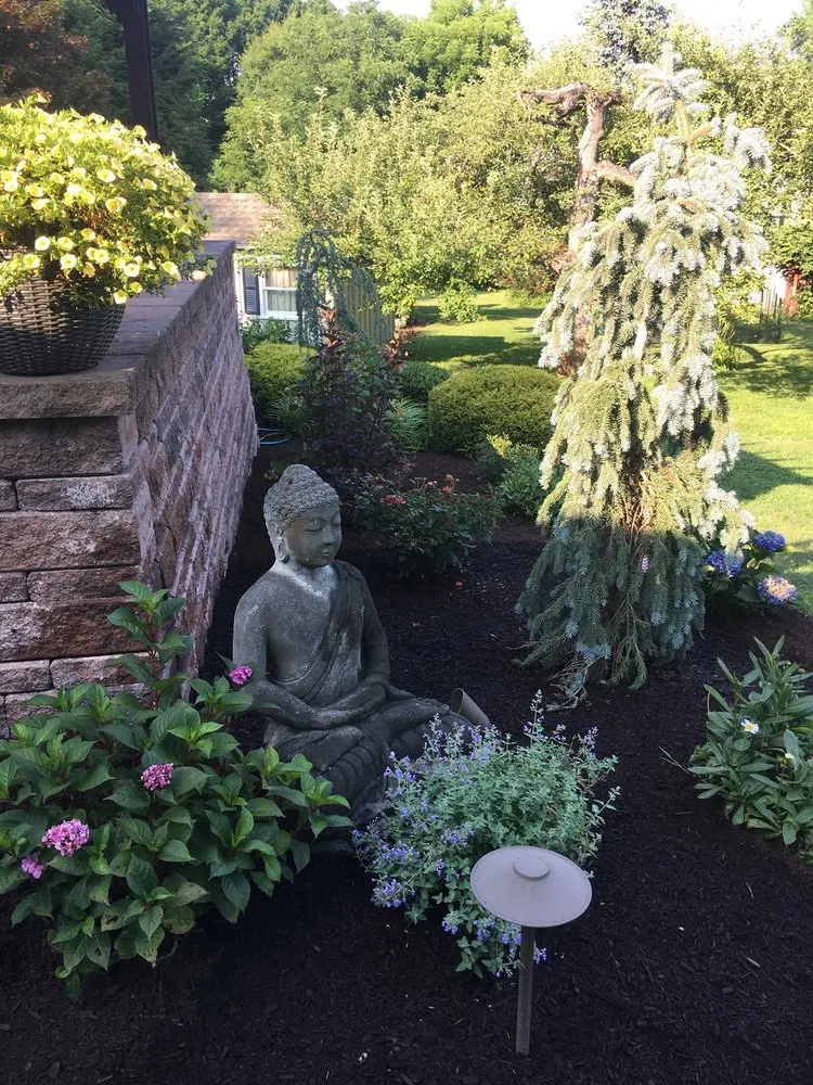 Reliable lawn mowing service for homes in Wilbraham, MA by Artec Landscaping