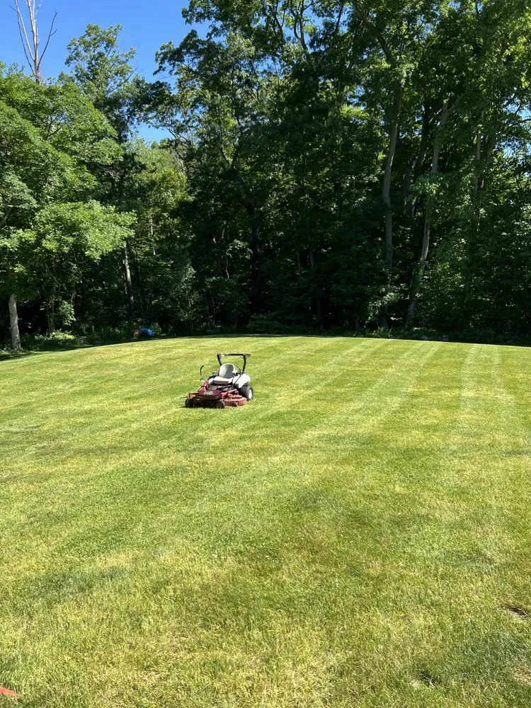 Top-rated lawn care service in Natick, MA by Arthur Property Maintenance