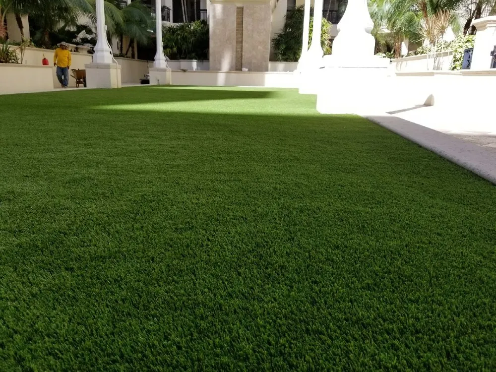 Local yard maintenance with custom design in Naples, FL by Artificial Grass Pros