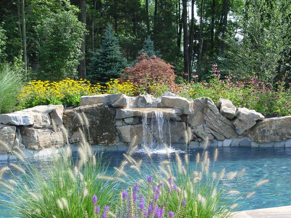 Affordable lawn mowing service with custom design across Montville, NJ - Artisan Landscapes and Pools