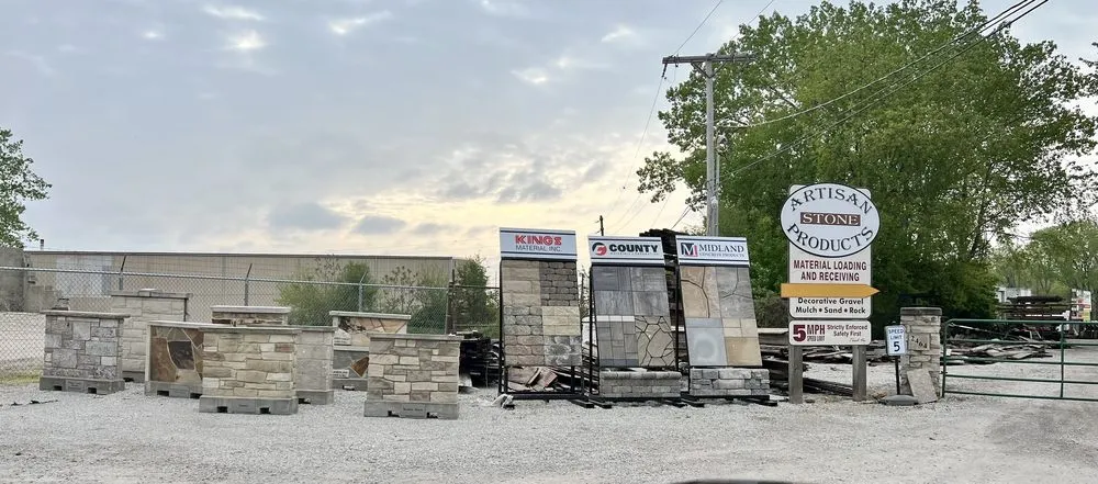 Affordable lawn mowing service for year-round maintenance in Springfield, IL by Artisan Stone Products