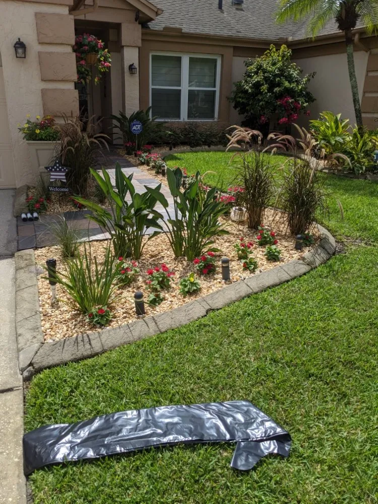 Professional lawn mowing service for residential properties in Longwood, FL by Artiscape