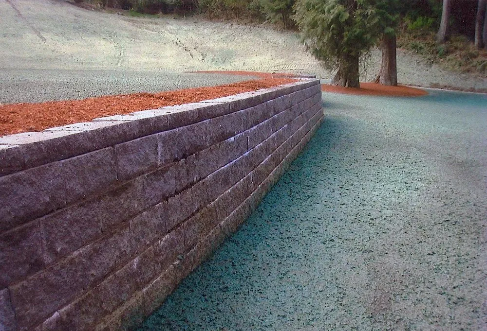 Affordable lawn mowing service for homes in Tacoma, WA by Artist Rock Wall