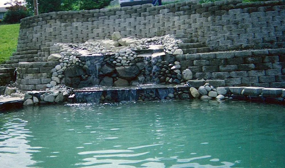 Local lawn mowing service in Tacoma, WA by Artist Rock Wall