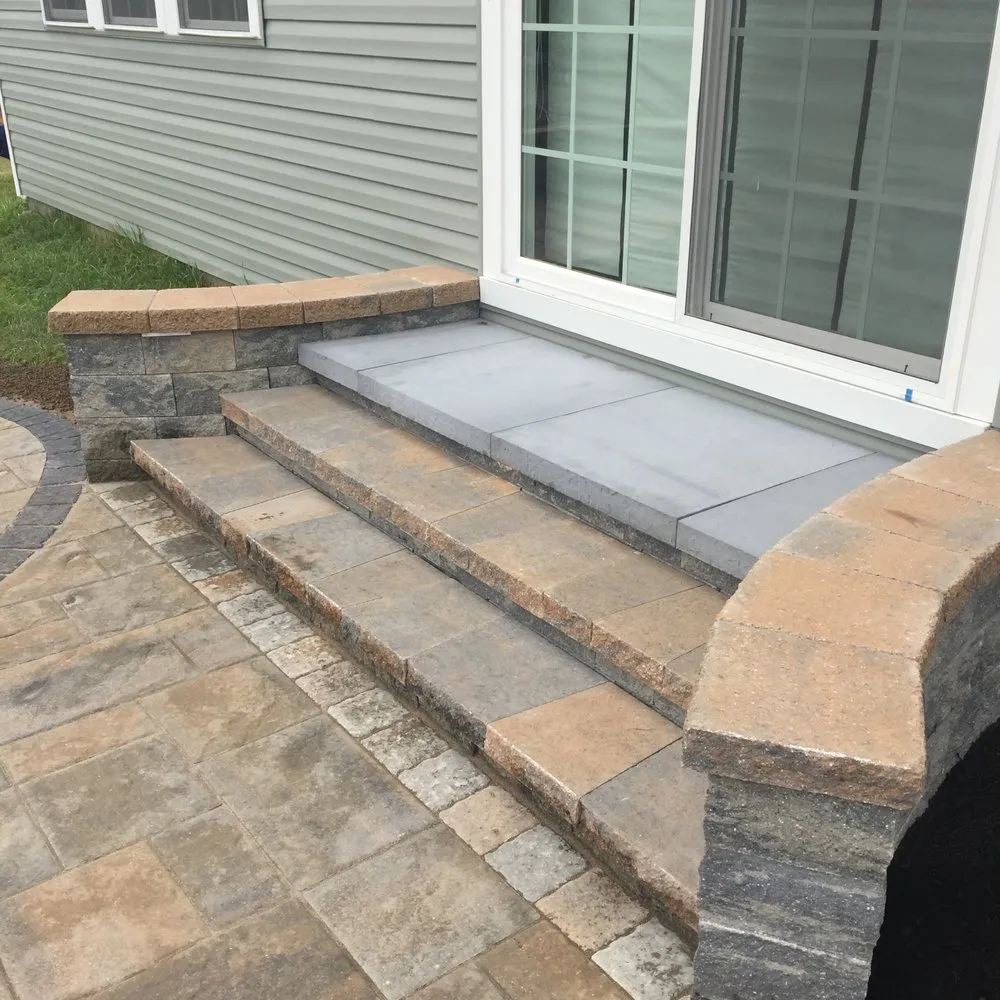 Professional lawn care service for residential properties in Northampton, PA by Artistic Hardscapes