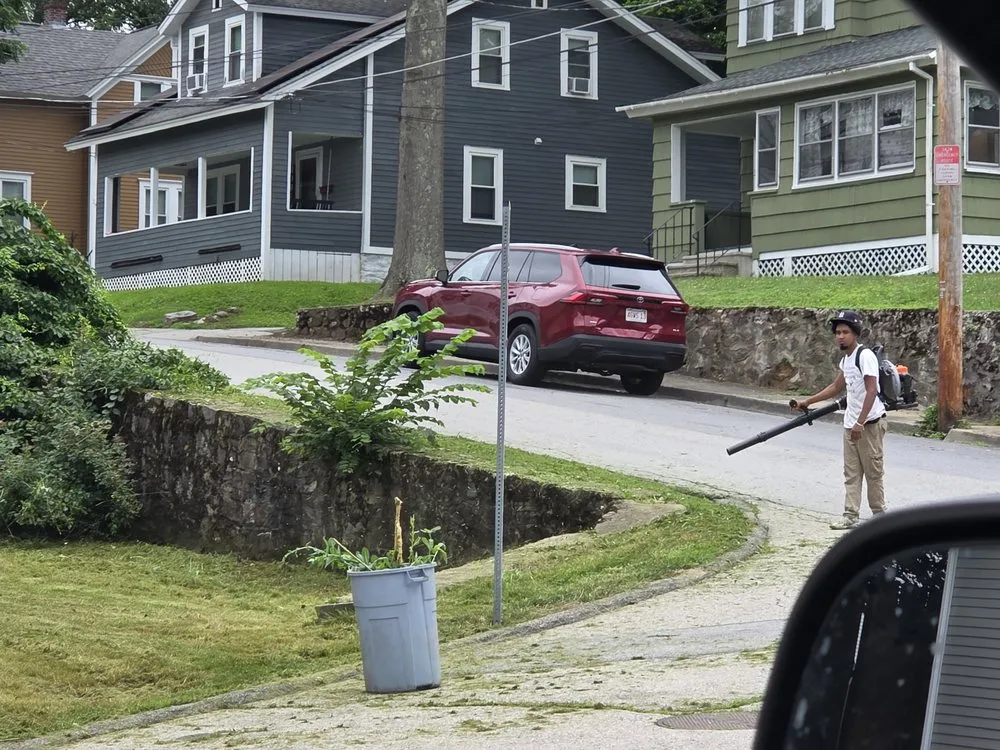 Affordable yard cleanup service for year-round maintenance in Worcester, MA by Artistic Home Improvement & Landscaping