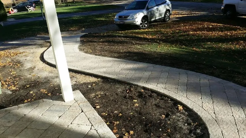 Professional yard cleanup service for outdoor upgrades across Des Plaines, IL - Artistic Landscapes, LLC