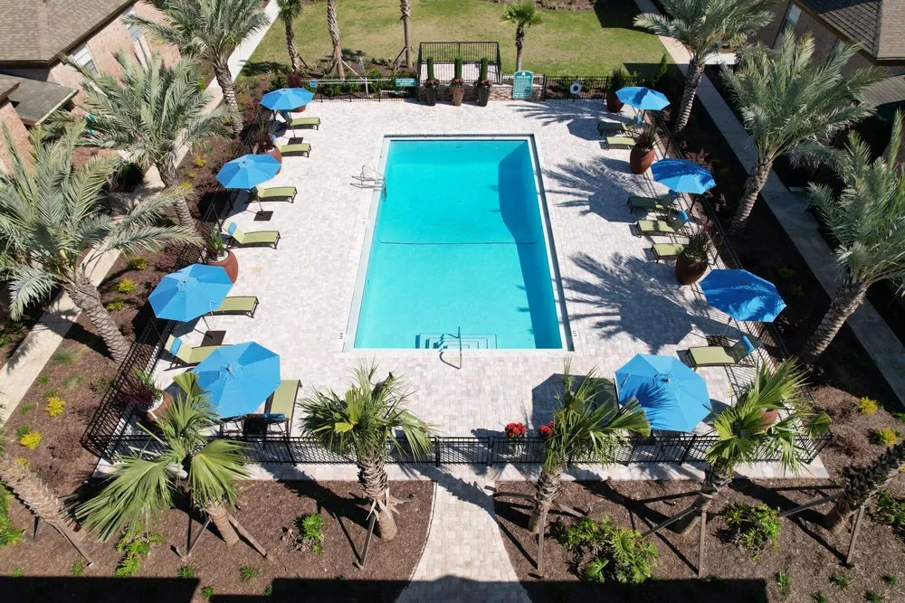 Custom lawn mowing service with custom design in Tallahassee, FL by Artistic Landscaping