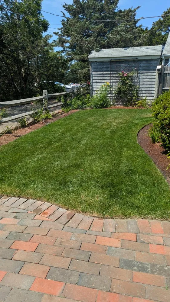 Reliable lawn mowing service in Barnstable, MA by Artstone Landscaping
