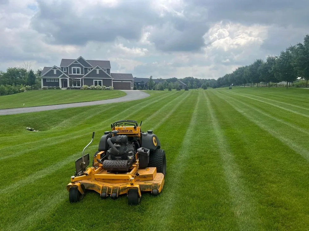 Professional outdoor landscaping with custom design in Belmont, MI by Ary Lawn Care