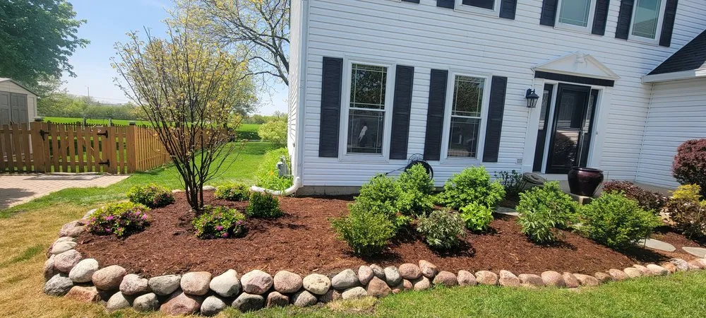 Professional landscape design for year-round maintenance in North Chicago, IL by A's Global Gardens