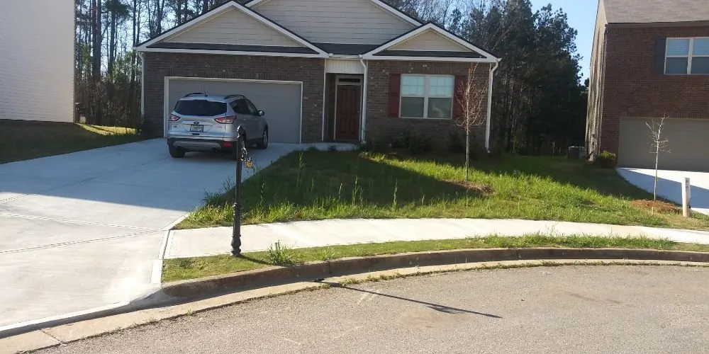 Affordable yard cleanup service with custom design in Jonsboro, GA by A&S Turf Cutters