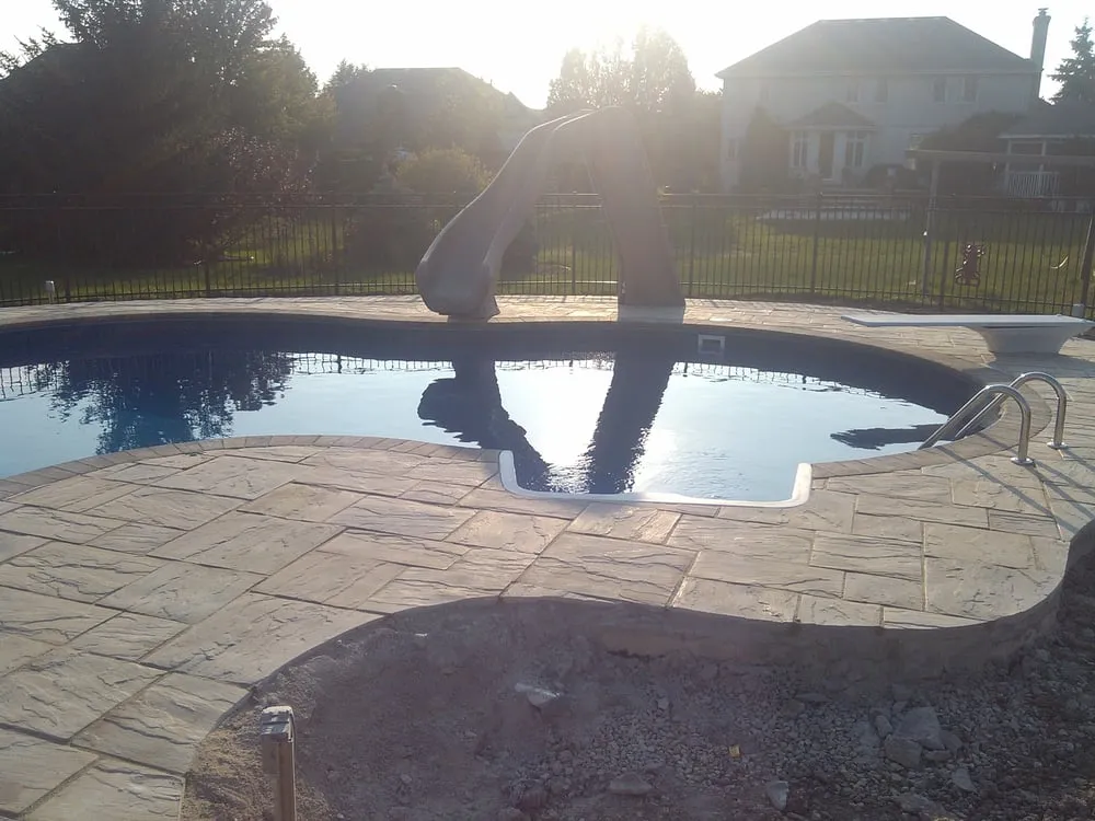 Professional landscape installation for residential properties in Romeoville, IL by ASE Illini-Scapes